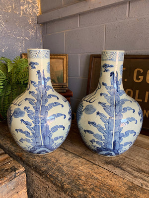 A pair of very large blue and white floor vases