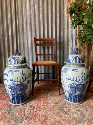 A pair of very large blue and white ginger jars