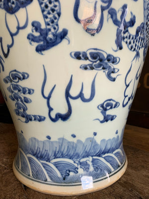 A pair of large blue and white ginger jars