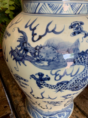 A pair of large blue and white ginger jars