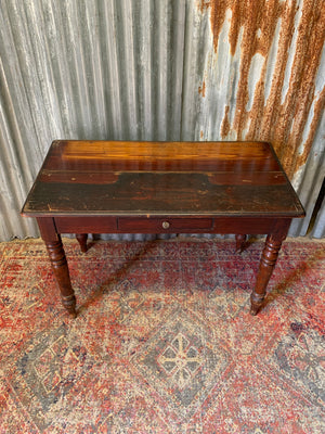 A Victorian single drawer table