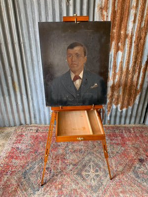 A floor-standing wooden field easel