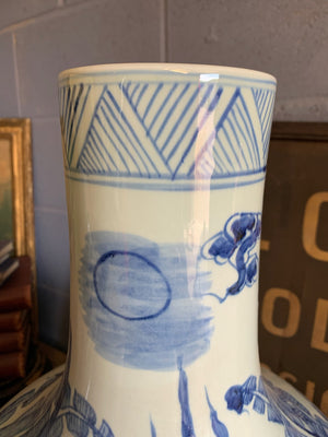 A pair of very large blue and white floor vases