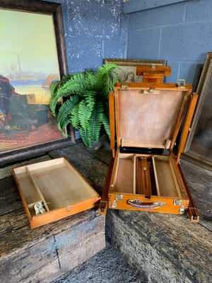 A floor-standing wooden field easel