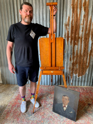 A floor-standing wooden field easel