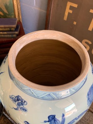 A pair of very large blue and white ginger jars