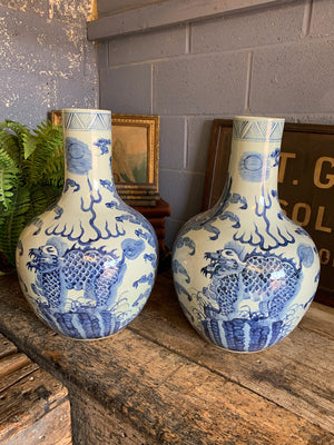 A pair of very large blue and white floor vases