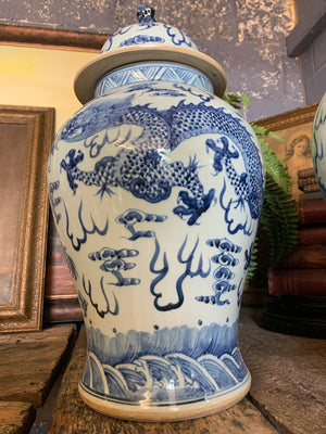 A pair of large blue and white ginger jars