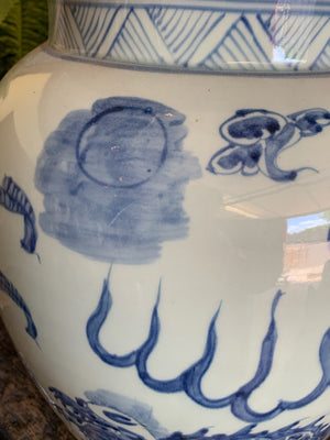 A pair of very large blue and white ginger jars