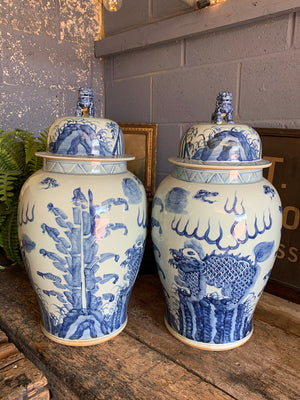 A pair of very large blue and white ginger jars