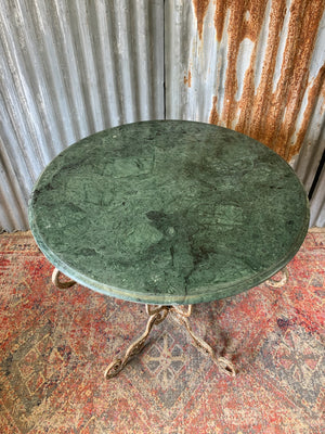 A French white cast iron table with green marble top attributed to Raymond Subes