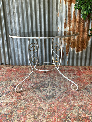 A mid-Century French wirework garden set - table and two chairs