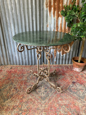 A French white cast iron table with green marble top attributed to Raymond Subes