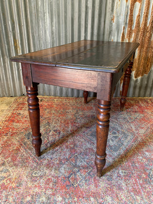 A Victorian single drawer table