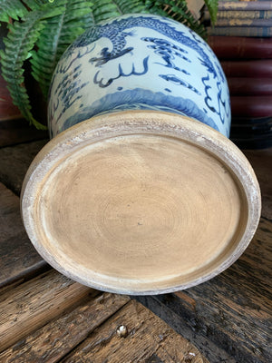 A pair of large blue and white ginger jars