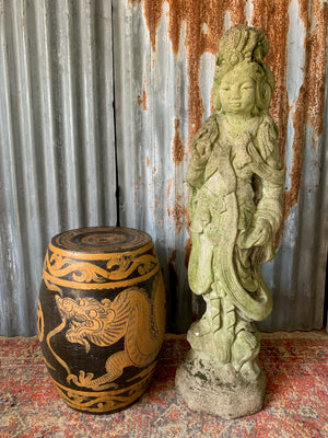 A cast stone garden statue of Guanyin