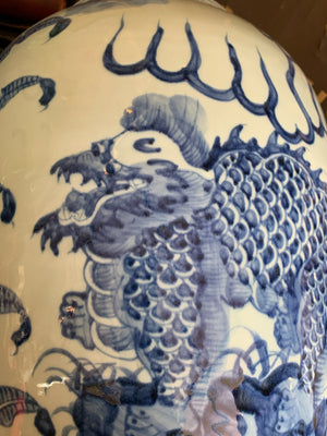 A pair of very large blue and white ginger jars