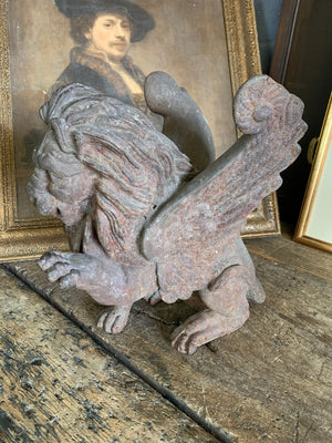 A 19th Century cast iron winged lion