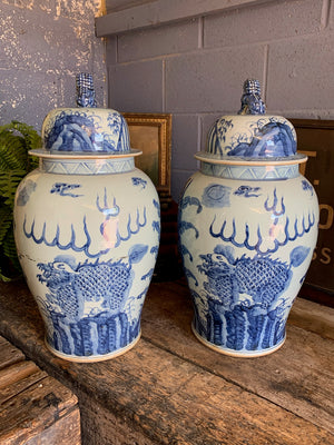 A pair of very large blue and white ginger jars