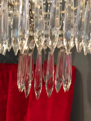 A continental crystal droplet 3 tier chandelier