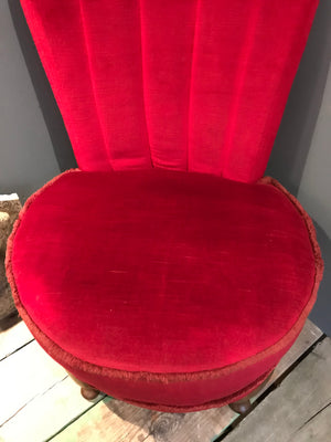 A pair of red velvet oyster shell back boudoir chairs