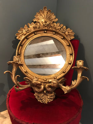 A vintage Regency style giltwood girandole mirror