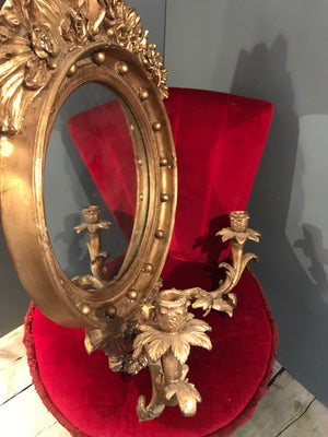 A vintage Regency style giltwood girandole mirror