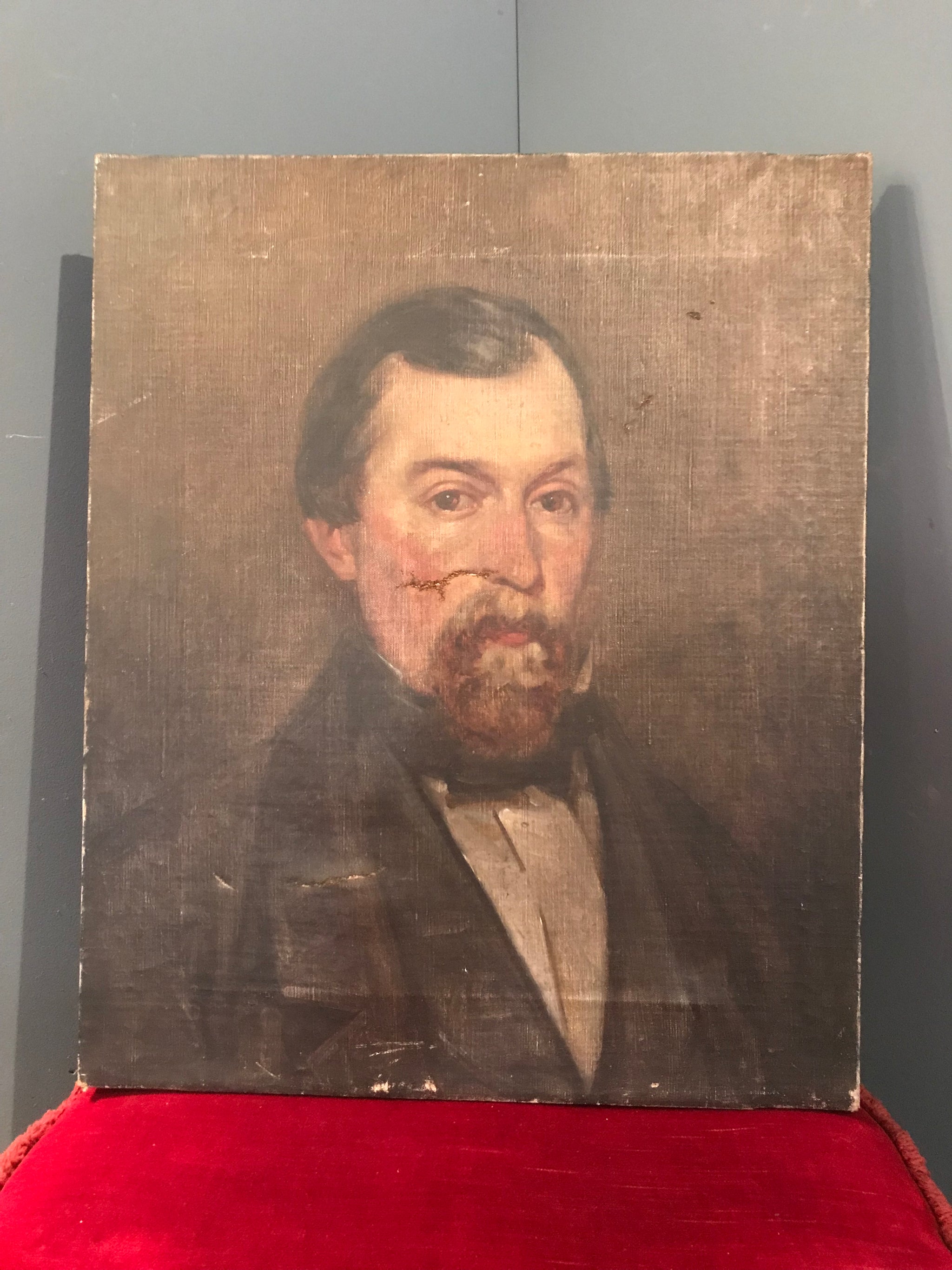 A Victorian portrait painting of a bearded gentleman