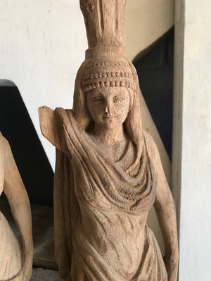 A pair of wooden hand-carved Arab female figures