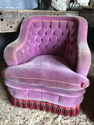 A glorious pair of purple velvet button back Hollywood Regency chairs