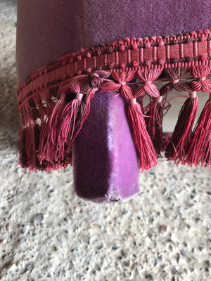 A glorious pair of purple velvet button back Hollywood Regency chairs