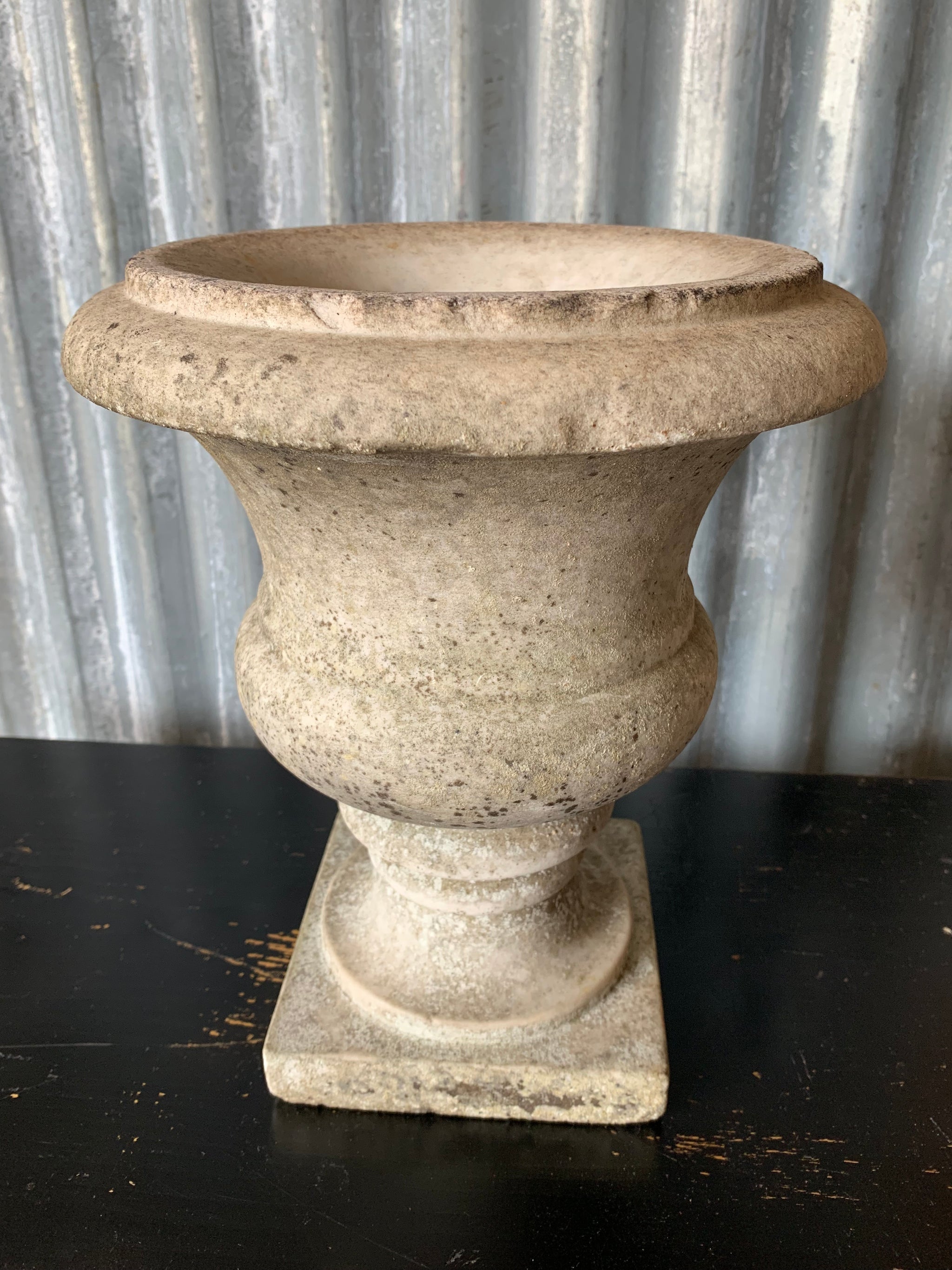 An elegant white grey marble urn