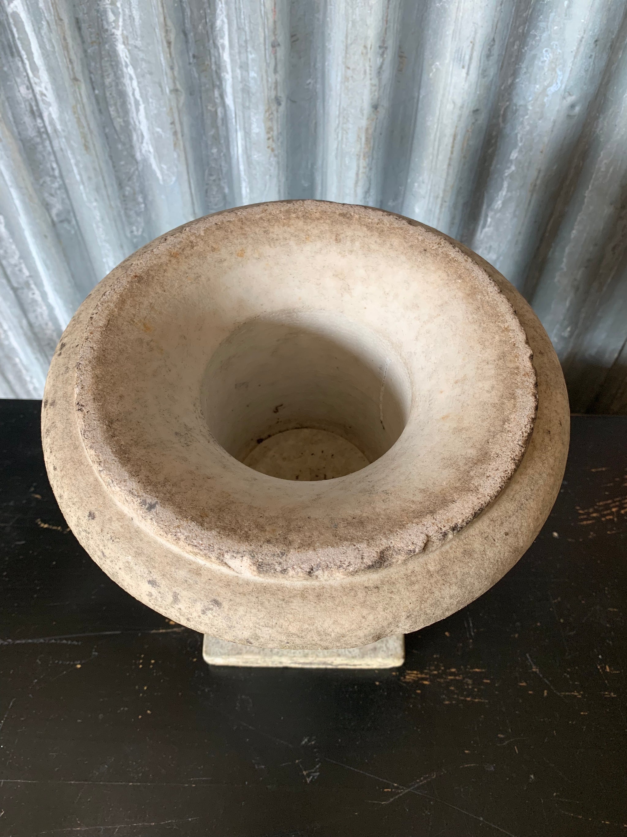 An elegant white grey marble urn