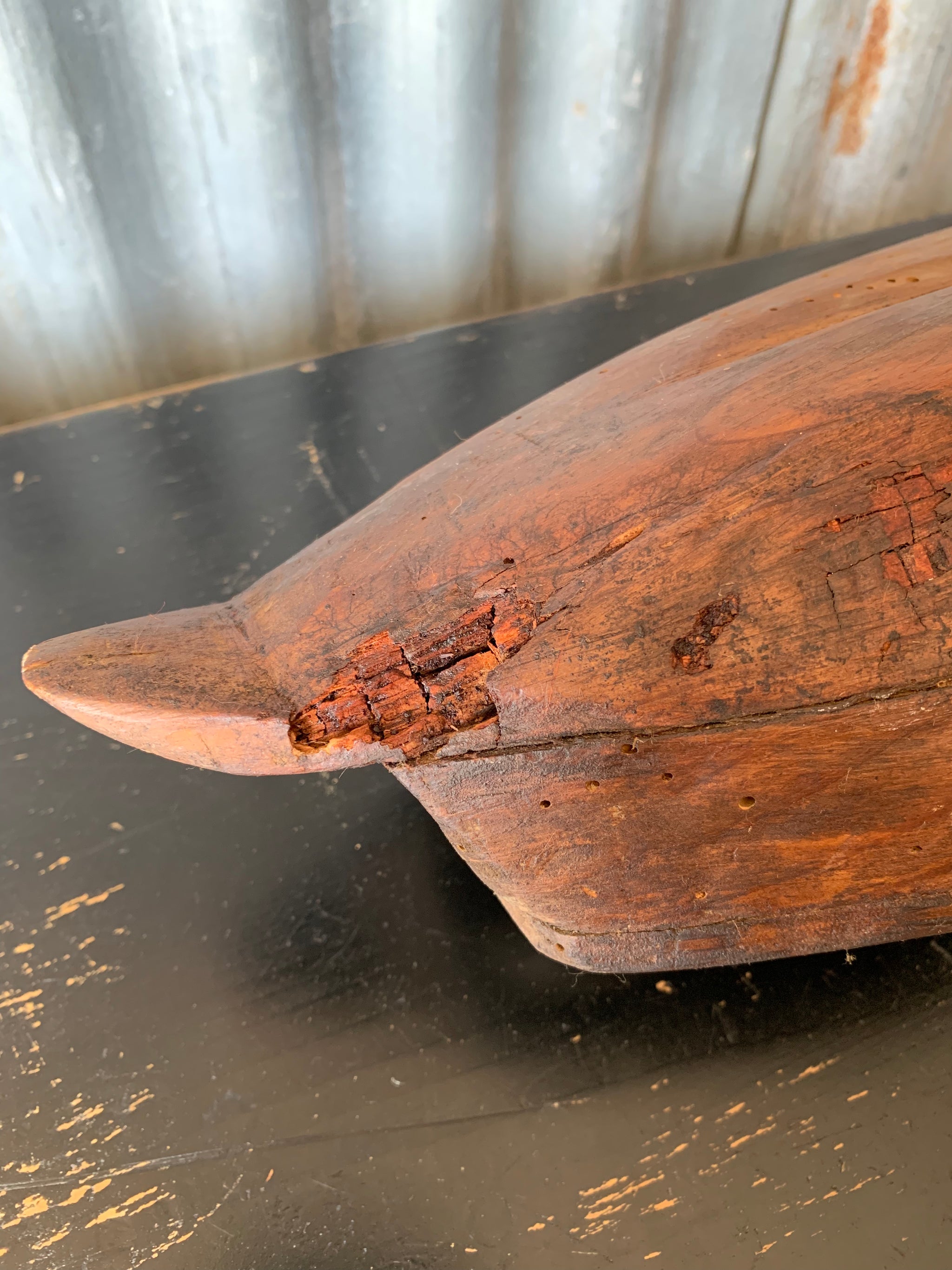 A primitive wooden duck decoy