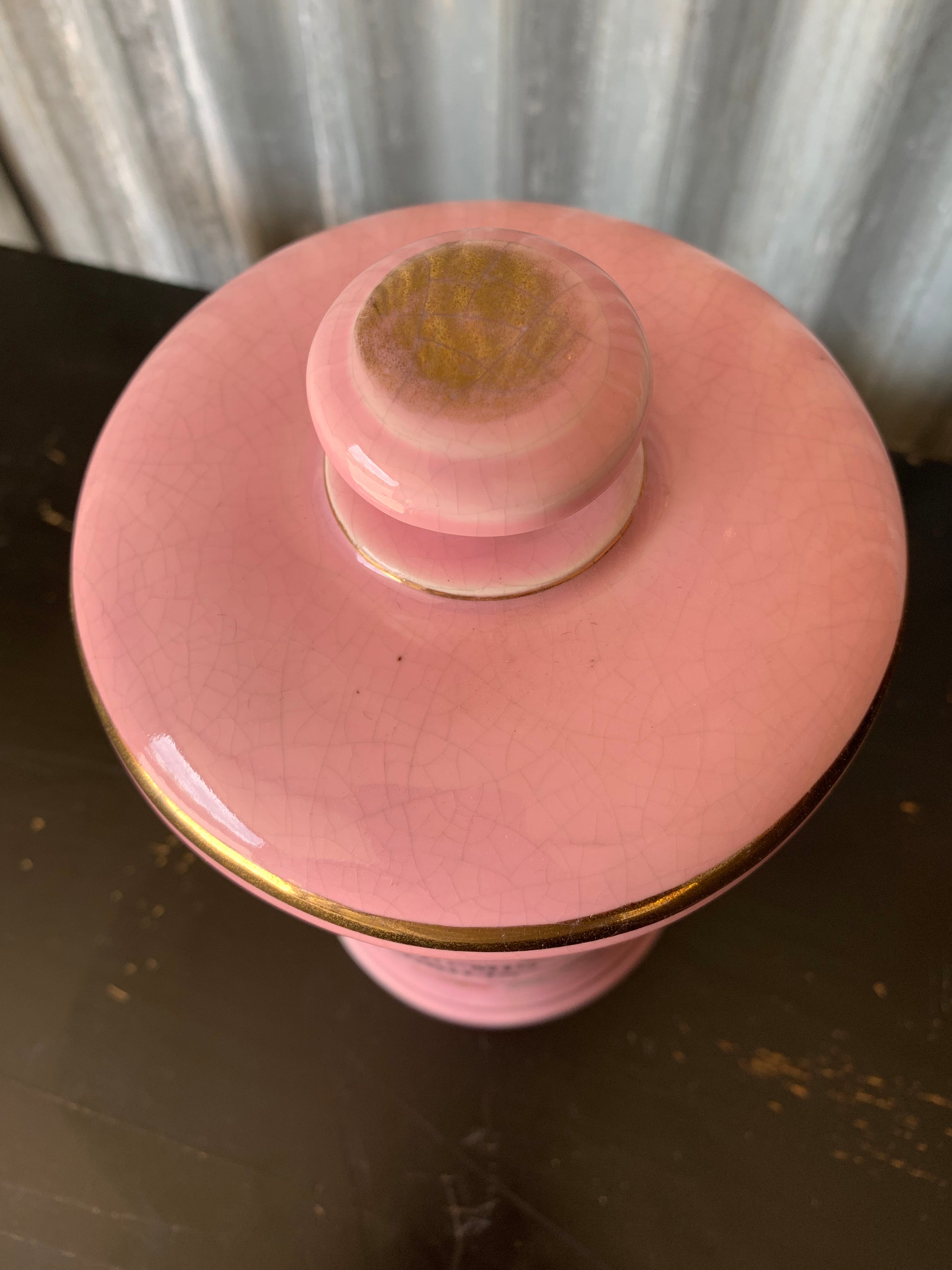 A large pink porcelain hand painted apothecary jar
