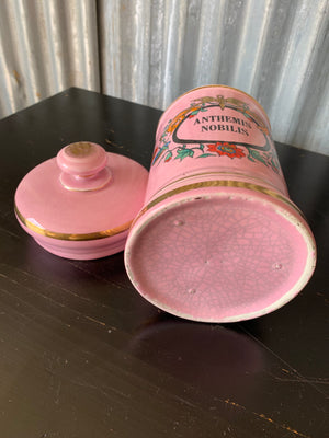 A large pink porcelain hand painted apothecary jar