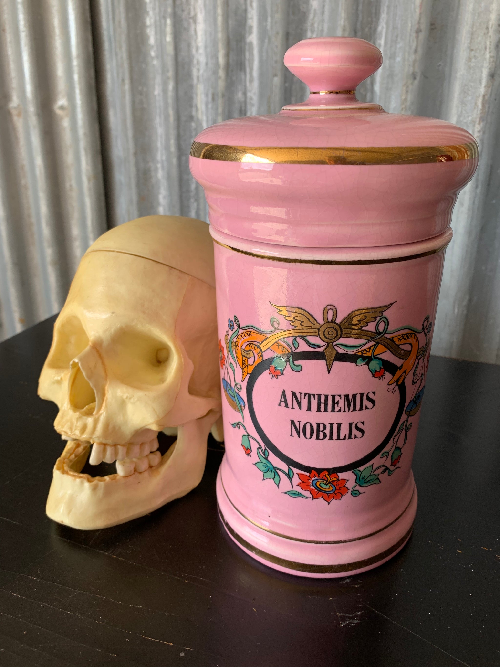 A large pink porcelain hand painted apothecary jar
