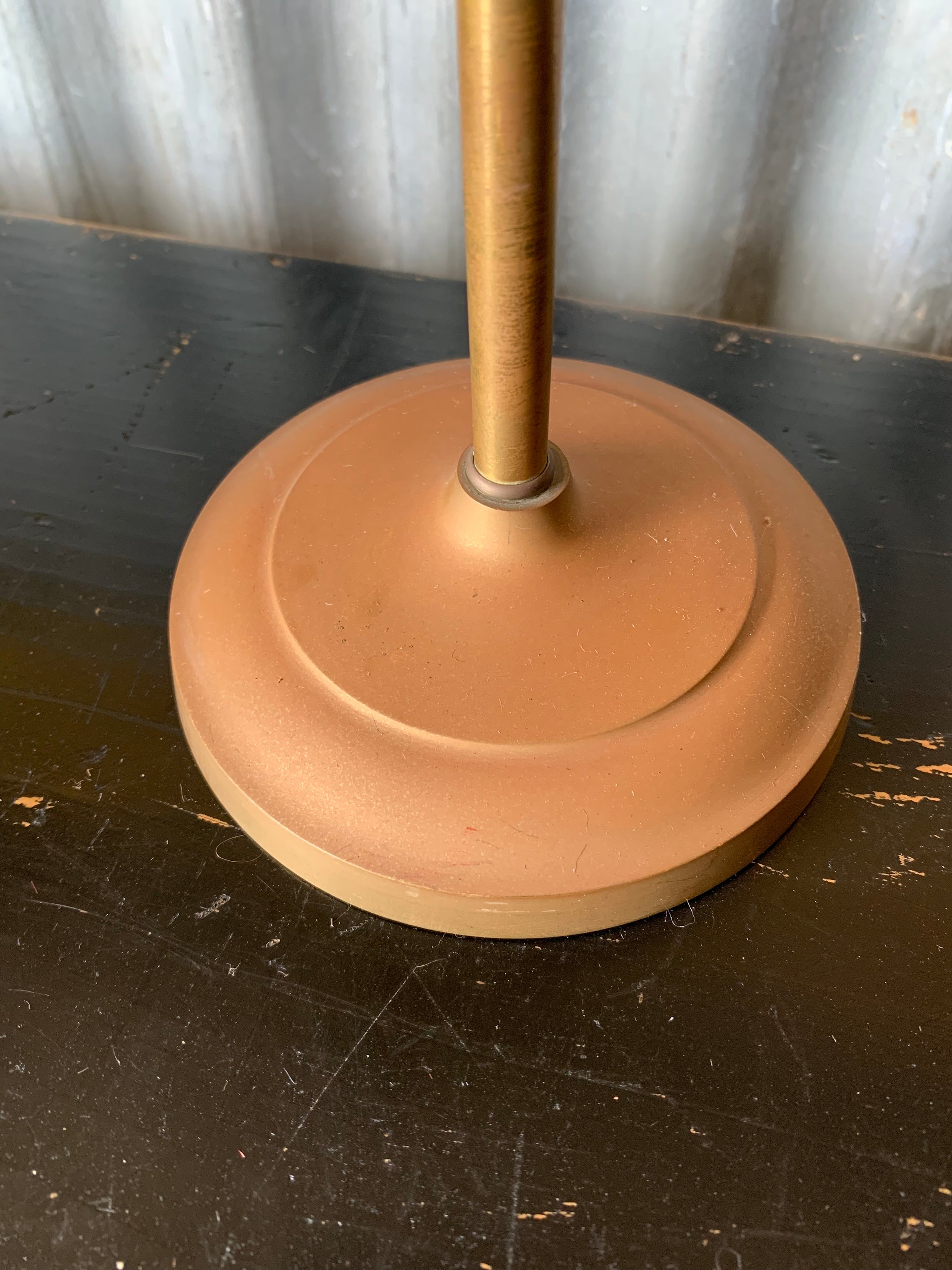 A vintage magnifying glass on a stand