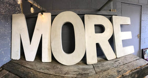 A set of extra large wooden trade sign letters MORE/ROME