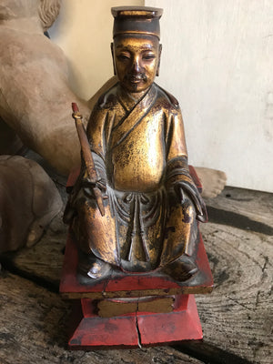 A 19th Century Chinese carved wood and gesso seated figure