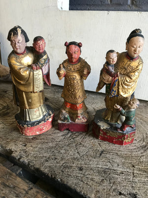 A 19th Century group of three Chinese carved wood and gesso figures