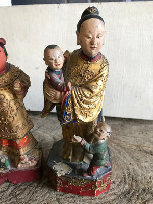 A 19th Century group of three Chinese carved wood and gesso figures