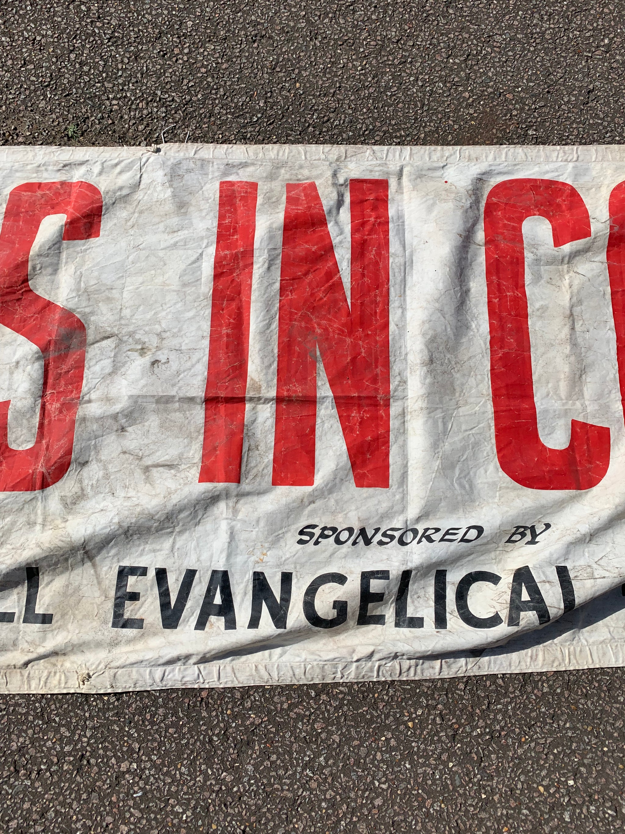 A very large advertising banner for the Billy Graham film 'Souls in Conflict' (1953)