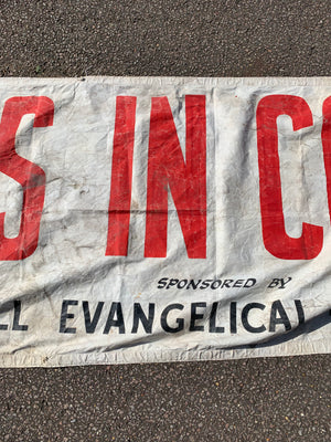 A very large advertising banner for the Billy Graham film 'Souls in Conflict' (1953)