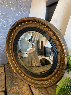 A very large Regency style Atsonea gilt convex ball mirror