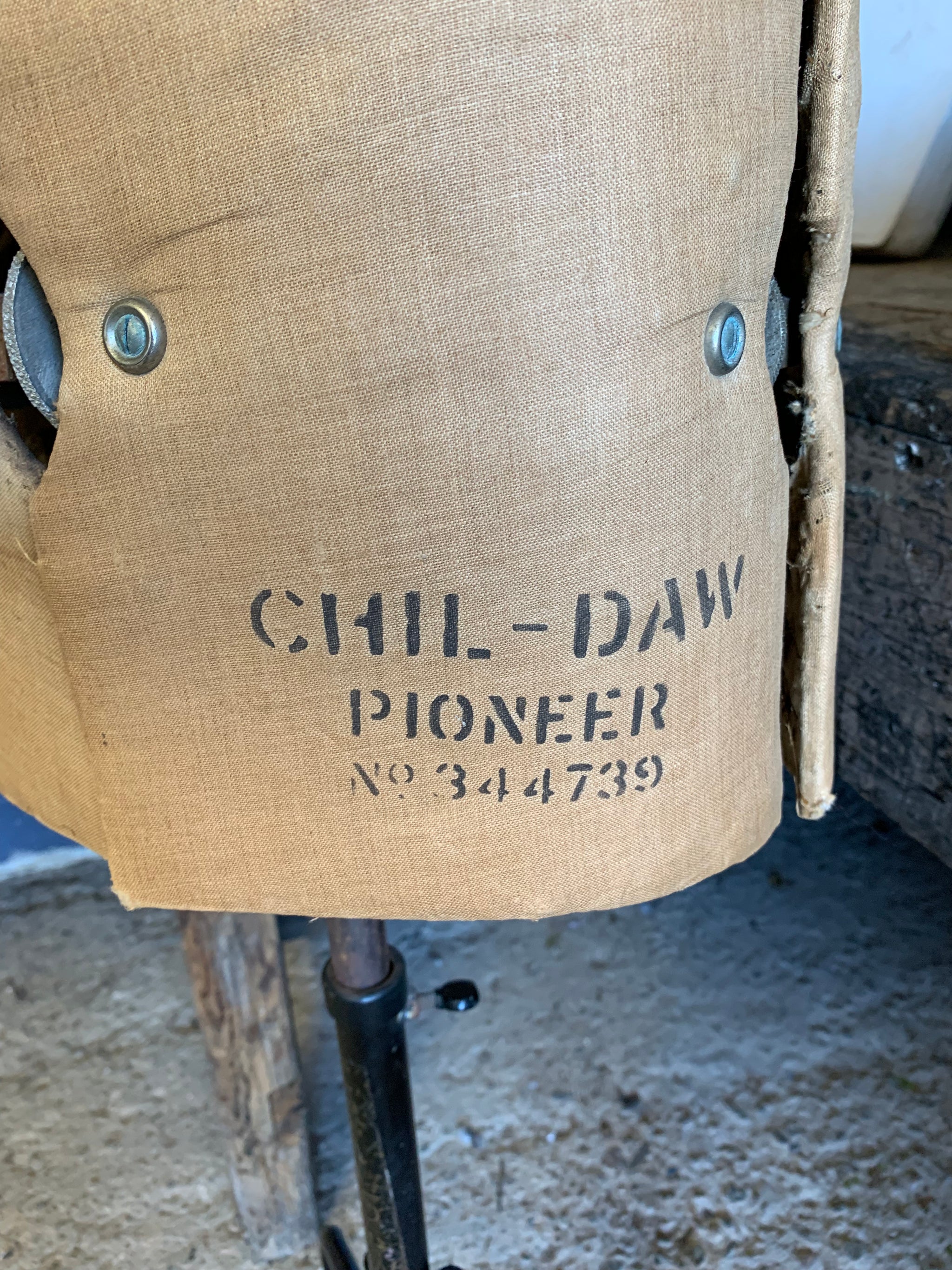 A Chil-Daw female mannequin dress form with cast iron base