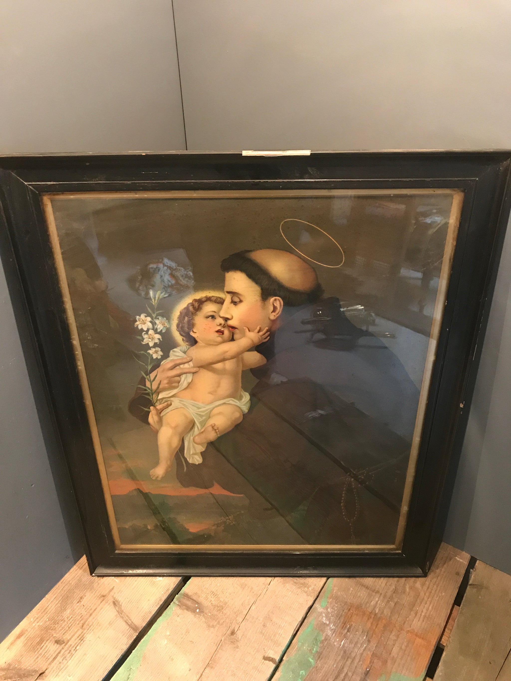 A large polychrome framed Italian print of St Anthony