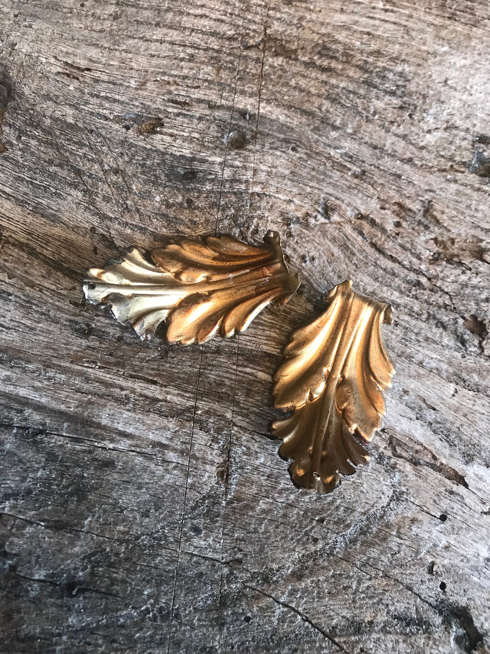 A gilt three tier crystal icicle droplet chandelier