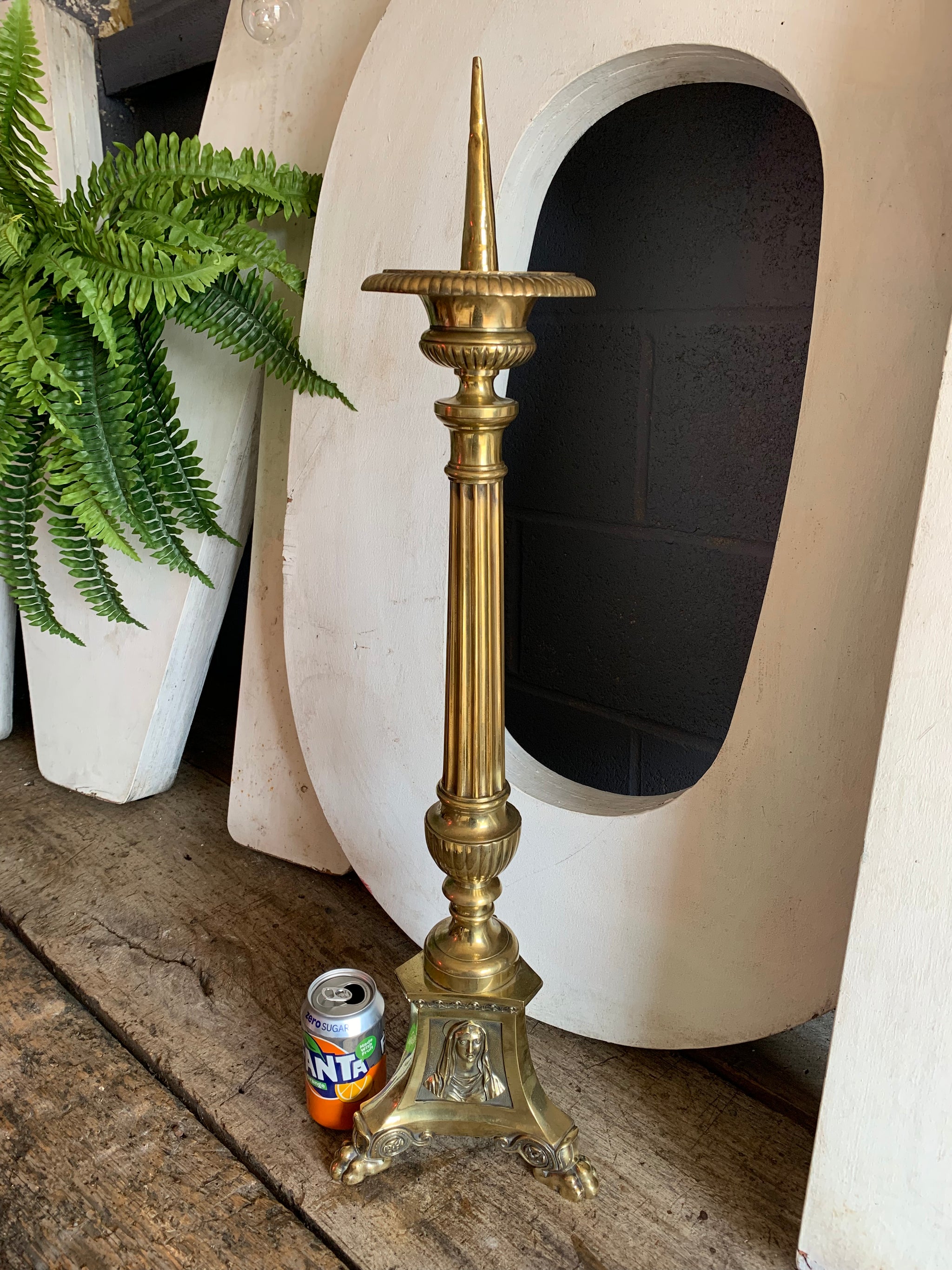 A large ornate brass Gothic church pricket candlestick