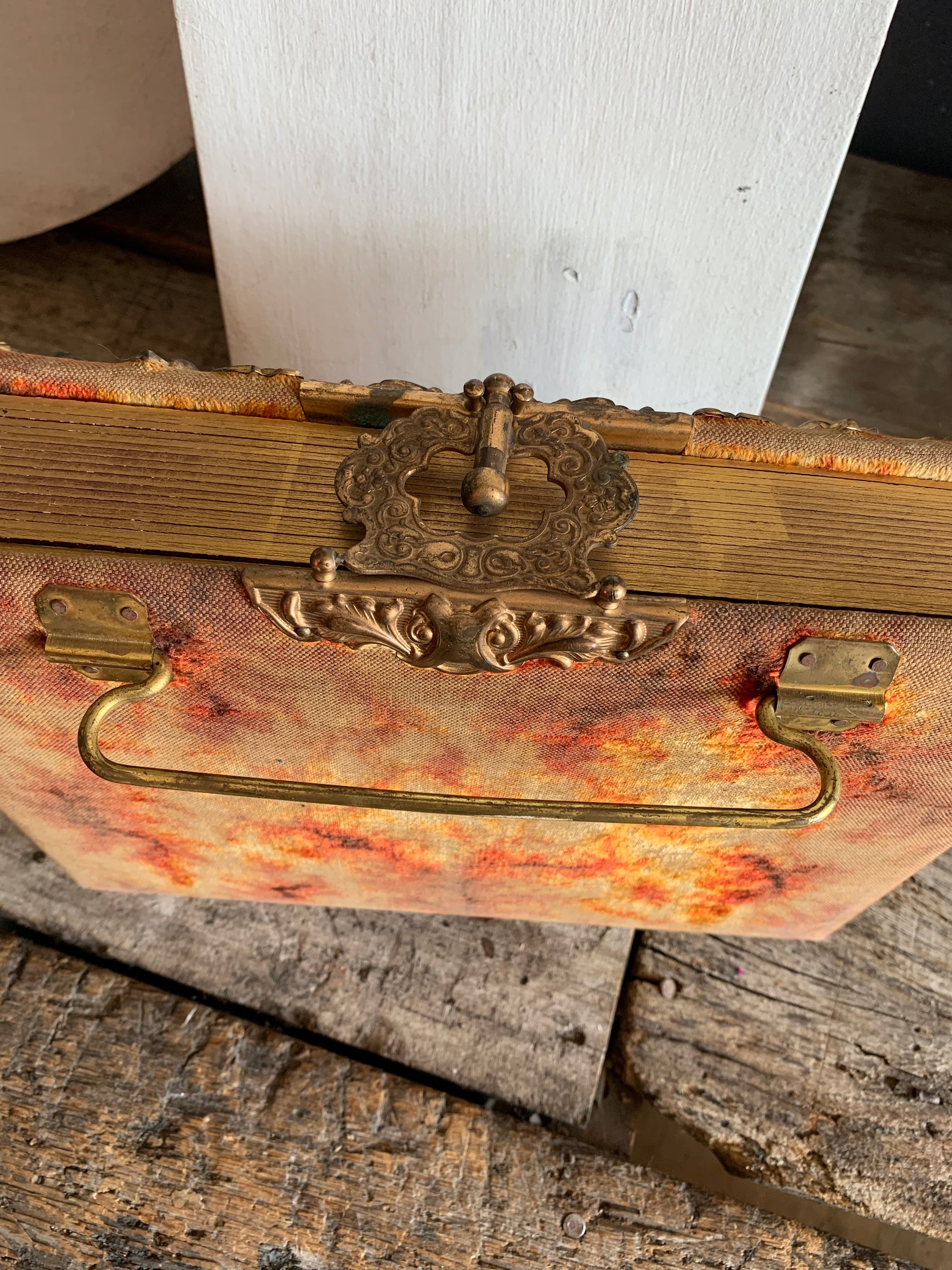 A Victorian cartes de visite photo album with velvet cover and heart-shaped mirror insert